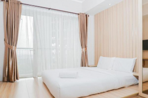 Clean and Elegant 1BR at The Oasis Apartment By Travelio